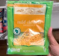 Mängden socker i Mild cheddar shredded cheese