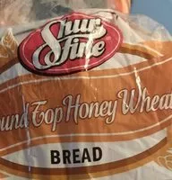 Mängden socker i Shur fine round top honey wheat bread