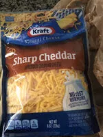 Mängden socker i Shredded sharp cheddar cheese