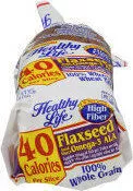 Mängden socker i Whole grain wheat bread flaxseed