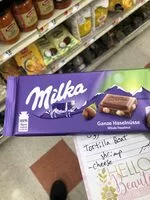 Mängden socker i Milk chocolate with whole hazelnuts