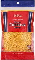 Mängden socker i Shredded Sharp Cheddar Cheese