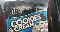 Mängden socker i Cookies & cream vanilla with cookie pieces frozen dairy dessert, cookies & cream