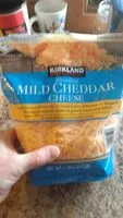 Mängden socker i Shredded Mild Cheddar Cheese