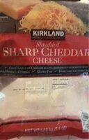 Mängden socker i Shredded sharp cheddar cheese