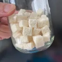 Mängden socker i Noix de coco en cubes