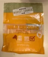 Mängden socker i Shredded mild cheddar cheese