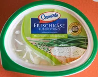 Mängden socker i Frischkäsezubereitung mit frischem Schnittlauch