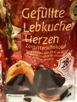 Mängden socker i Lebkuchenherzen, fruchtig gefüllt, überzogen mit Zartbitterschokolade