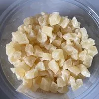 Mängden socker i Ananas déshydraté en cube