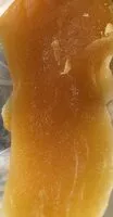 Mängden socker i Mangue deshydratee en lamelle