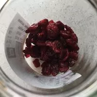 Mängden socker i Cranberries séchées en moitiés