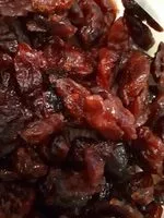 Mängden socker i Cranberries séchées en moitiés