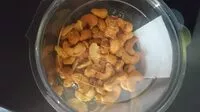 Mängden socker i Noix de cajou grillées aromatisées au curry