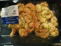 Mängden socker i Queues de crevettes cuites décortiquer marinées ail