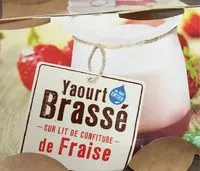 Mängden socker i Yaourt brassé sur lit de confiture de Fraise
