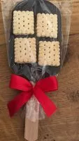 Mängden socker i Sucette en chocolat noir avec petits biscuits