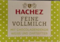 Mängden socker i Edelvollmilchschokolade mit weißer und Zartbitterschokolade garniert