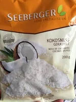 Mängden socker i Kokosnuss geraspelt