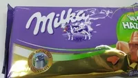 Mängden socker i Milka chocolate tablet milk with whole nuts