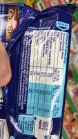 Mängden socker i Bonbons dragéifiés chocolat au lait