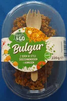 Mängden socker i Bulgur z serem w stylu śródziemnomorskim i hummusem