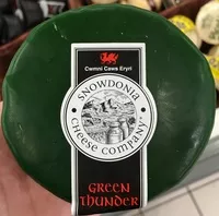 Mängden socker i Green Thunder Cheddar Cheese with Roasted Garlic & Herbs (33,6% MG)