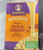 Mängden socker i Annies - deluxe rich & creamy shells and aged cheddar