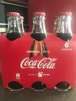 Mängden socker i Coca-cola bouteille en verre