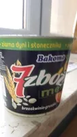 Mängden socker i jogurt z brzoskwinia i gruszka oraz zbożami, ziarnami słonecznika i dyni