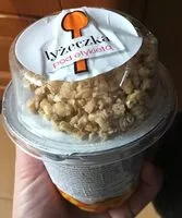 Mängden socker i Yogur con melocoton y muesli