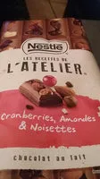 Mängden socker i NESTLE L'ATELIER Chocolat au Lait, Cranberries, Amandes et Noisettes