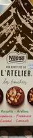 Mängden socker i NESTLE L'ATELIER Les Bouchées Boite sapin lait et noir 162g