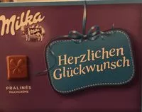 Mängden socker i Milka Herzlichen Glückwunsch Pralinés Milchcrème