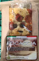 Mängden socker i Focaccia Mit Schwarzen Oliven Und Tomaten