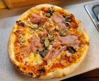 Pizza with ham and mushrooms