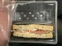 Mängden socker i tramezzini con prosciutto crudo e parmigiano reggiano