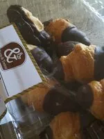 Mängden socker i Croissant con medio baño de chocolate