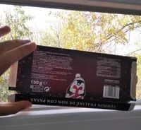 Mängden socker i Turrón praliné de ron con pasas