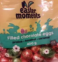 Mängden socker i Oeufs chocolat au lait avec Praliné, Caramel et de Noisette avec Crisp