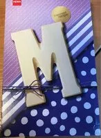 Mängden socker i Lettre M en chocolat blanc